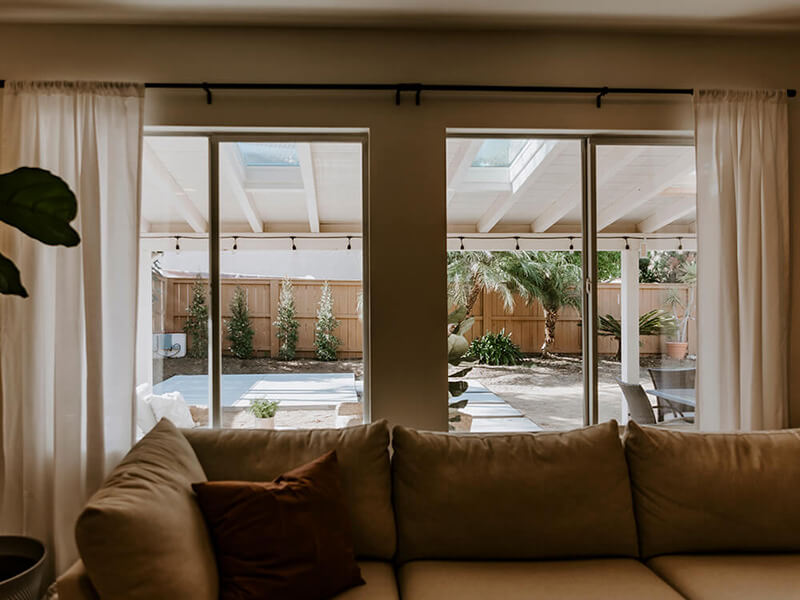 View of the hot tub pad from a family room.